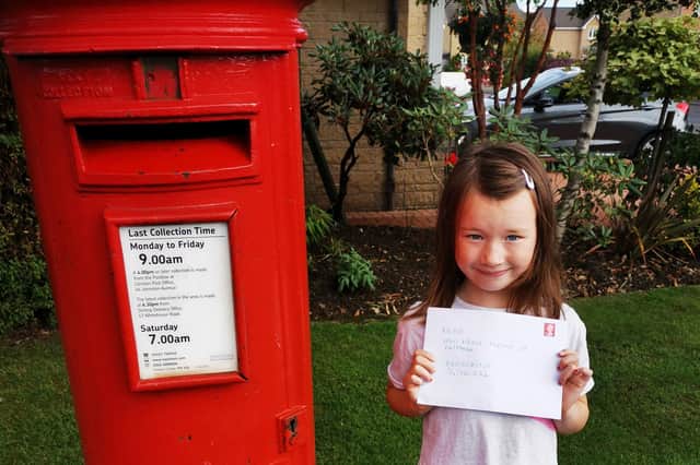 Cora Kelly Bell at the postbox in Stirling. PIC: PA.