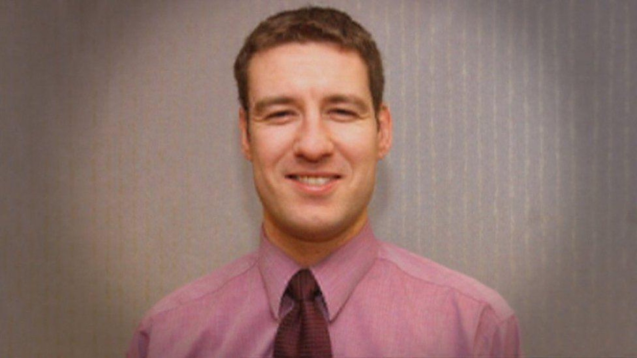Murder squad detectives issue new description of hitman who killed Nairn banker