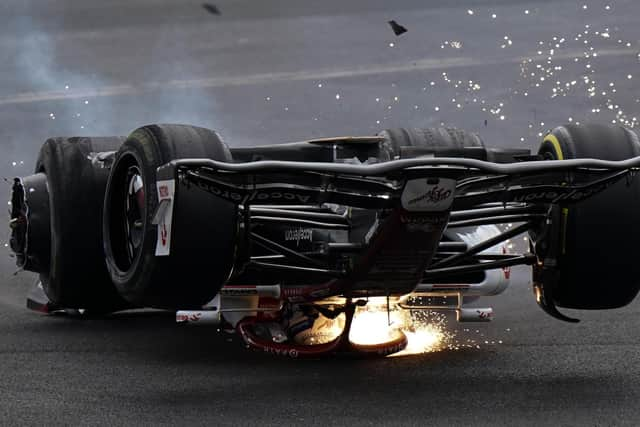 Alfa Romeo's Zhou Guanyu slides towards the barrier after a collision at the start of the race during the British Grand Prix 2022 at Silverstone, Towcester. Picture date: July 3, 2022.