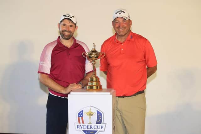Europe's current Ryder Cup captain Padraig Harrington and his predecessor, Thomas Bjorn, pose with the trophy. Picture: Andrew Redington/Getty Images.