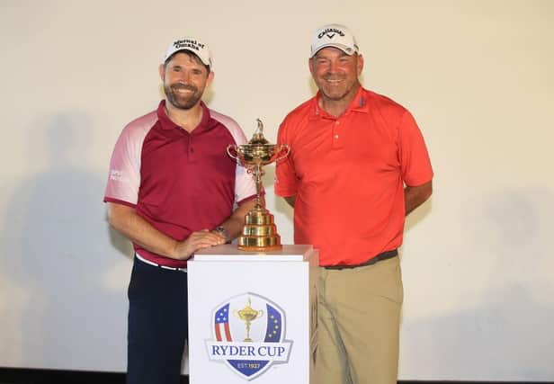 Europe's current Ryder Cup captain Padraig Harrington and his predecessor, Thomas Bjorn, pose with the trophy. Picture: Andrew Redington/Getty Images.