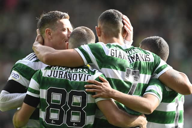 Celtic players celebrate their second goal in their 2-0 win over Hearts. (Photo by Rob Casey / SNS Group)