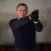 Daniel Craig playing James Bond in the new Bond film No Time To Die.