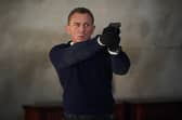 Daniel Craig playing James Bond in the new Bond film No Time To Die.