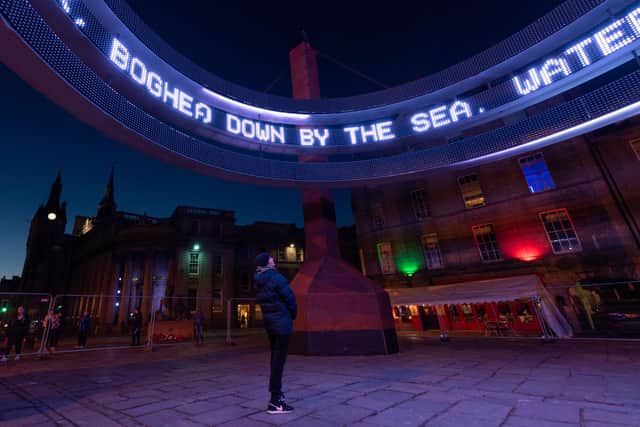TOGETHER has taken over Castlegate in Aberdeen for this year's SPECTRA festival of light. The giant installation beams giant rotating text of memories and stories shared by local people and was created in response to lockdown to bring communities together in a shared experience. PIC: Ian Georgeson.