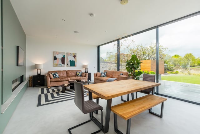 The couple upgraded three of the rooms immediately upon moving in, before teaming up with award-winning Edinburgh architects Studio LBA to create a rear extension that houses an open-plan kitchen and dining space with full-height sliding glass doors.