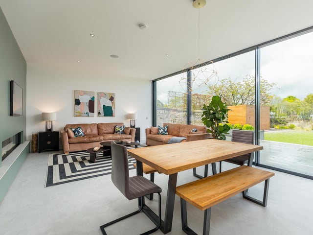 The couple upgraded three of the rooms immediately upon moving in, before teaming up with award-winning Edinburgh architects Studio LBA to create a rear extension that houses an open-plan kitchen and dining space with full-height sliding glass doors.