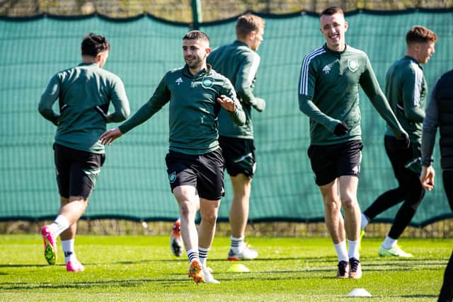 Greg Taylor and David Turnbull during a Celtic training session at Lennoxtown.