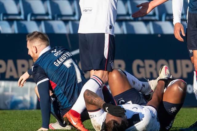 Ross County's Michael Gardyne collides with Alfredo Morelos during the Scottish Premiership match between Ross County and Rangers at the Global Energy Stadium on December 06, 2020, in Dingwall, Scotland. (Photo by Craig Foy / SNS Group)