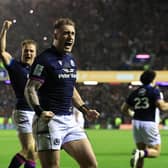 Stuart Hogg, the Scotland captain, celebrates the 20-17 victory over England. (Photo by David Rogers/Getty Images)