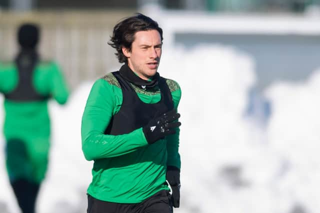 Back from injury and back in the squad, Hibs midfielder Joe Newell is still weighing up his future as talks on a contract extension continue. Photo by Mark Scates / SNS Group