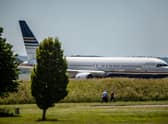 A plane standing-by at MOD Boscombe Down, Salisbury. A flight taking asylum seekers to Rwanda is believed to be leaving from a Westcountry RAF military aircraft testing site after a last-ditch legal bid to halt the controversial deportation policy failed. Picture: Adam Hughes/SWNS