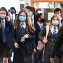 Scottish pupils will need to wear face masks in schools until the October holidays.