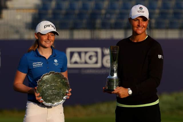 Louise Duncan, the leading amateur, and winner Anna Nordqvist show off their trophies from the 2021 AIG Women's Open. Picture: Andrew Redington/Getty Images.
