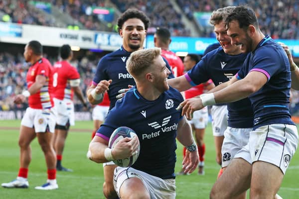 Kyle Steyn (left) celebrates his second and Scotland's fifth try in the win over Tonga at BT Murrayfield. (Photo by Craig Williamson / SNS Group)