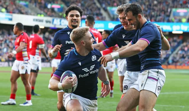 Kyle Steyn (left) celebrates his second and Scotland's fifth try in the win over Tonga at BT Murrayfield. (Photo by Craig Williamson / SNS Group)