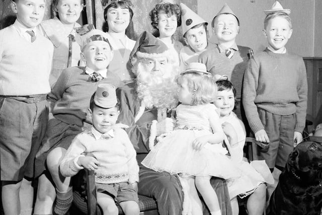 Chief Constable Merrilees acts as Santa Claus at a children's home Christmas party in Edinburgh in 1962.