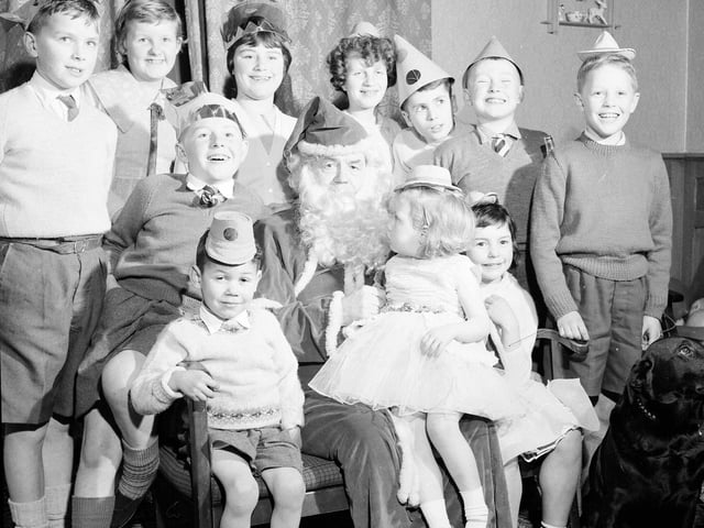 Chief Constable Merrilees acts as Santa Claus at a children's home Christmas party in Edinburgh in 1962.