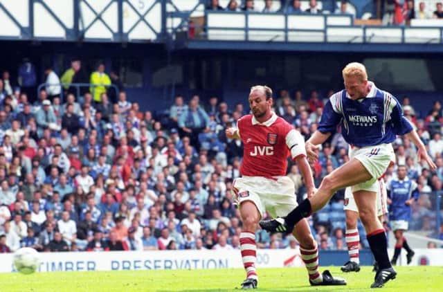 Jorg Albertz gets in front of Arsenal defender Steve Bould to score for Rangers in Richard Gough's testimonial match at Ibrox in 1996. (Photo by SNS Group).