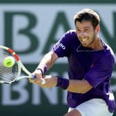 Cameron Norrie returns a shot in his semi-final win over Grigor Dimitrov at Indian Wells. (Photo by Matthew Stockman/Getty Images)