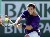Cameron Norrie returns a shot in his semi-final win over Grigor Dimitrov at Indian Wells. (Photo by Matthew Stockman/Getty Images)