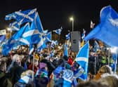 Scottish Independence supporters are seen at a demo outside Holyrood, the Scottish Parliament, on November 23, 2022 in Edinburgh, Scotland. Earlier today, the UK Supreme Court judges unanimously rejected the Scottish government's argument that it can hold a second independence referendum. (Photo by Peter Summers/Getty Images)