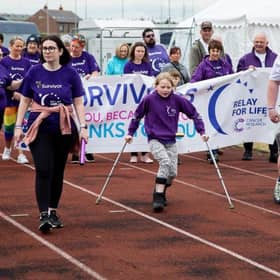 ​The event gets underway with the Survivors’ lap of honour.