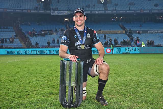 Glasgow Warriors' Henco Venter poses with the URC trophy after the victory over the Vodacom Bulls in the final at Loftus Versfeld on June 22. (Photo by Anton Geyser/SNS Group)