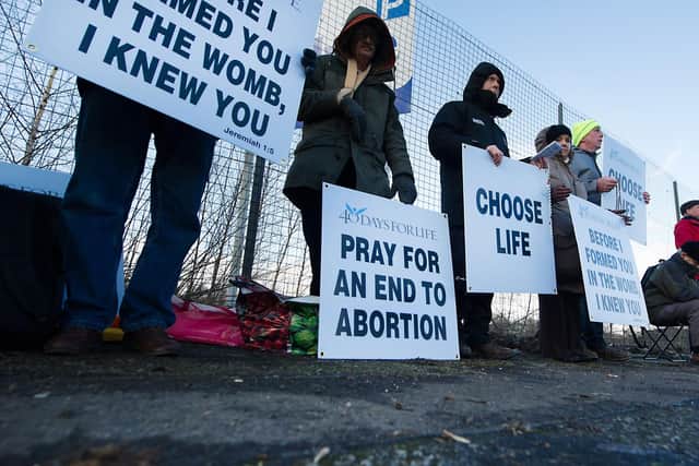 Anti-abortion campaigners protest outside Glasgow's superhospital (Photo: John Devlin).