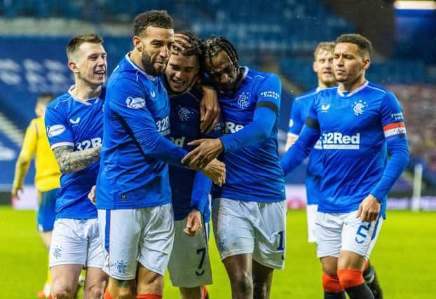 Ianis Hagi celebrates his goal with teammates during the Scottish Premiership match between Rangers and St Johnstone at Ibrox Stadium, on February 03, 2021, in Glasgow, Scotland. (Photo by Alan Harvey / SNS Group)