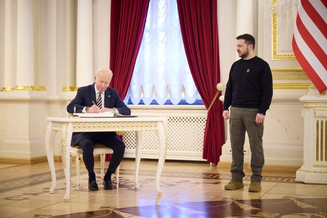 Handout photo issued by the Office of the President of Ukraine of President Volodymyr Zelensky welcoming US President Joe Biden to Kyiv, Ukraine. President Biden has made an unannounced visit to Ukraine in a gesture of solidarity days before the one-year anniversary of Russia's invasion of the country. Picture date: Monday February 20, 2023.