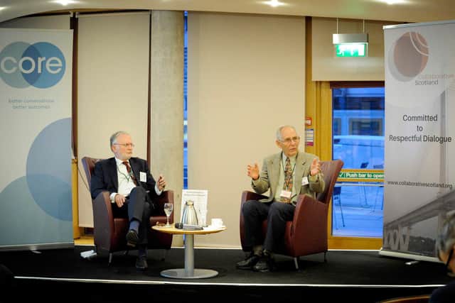 Ken Cloke in conversation with John Sturrock at a Scottish Parliament event
