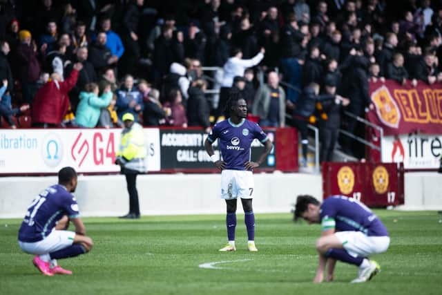 The Hibs players are left devastated at Motherwell after missing out on the top six.