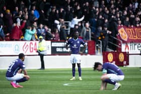 The Hibs players are left devastated at Motherwell after missing out on the top six.