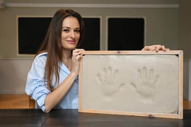 Nicola Benedetti's handprints can now be seen outside the City Chambers after she was recognised with the Edinburgh Award. Picture: Greg Macvean