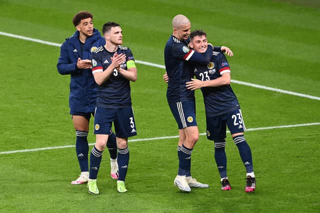 Scotland celebrate the draw at Wembley.