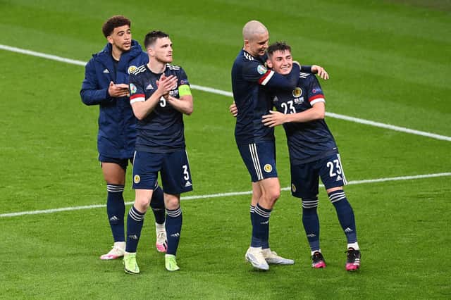 Scotland celebrate the draw at Wembley.