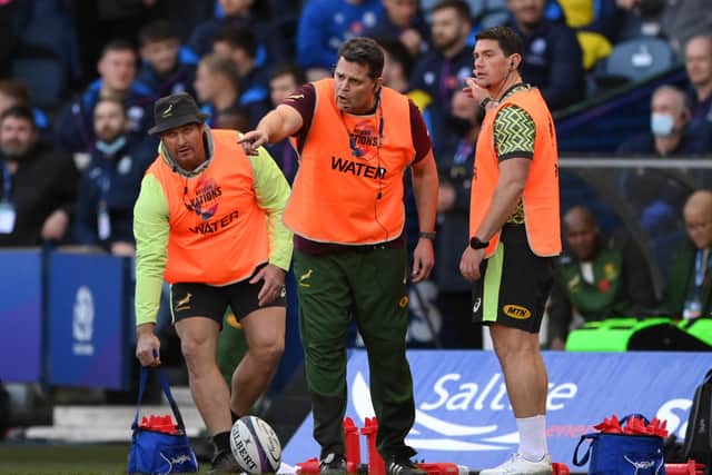 Rassie Erasmus, centre, gives out instructions to his South Africa players during the Autumn Nations Series match against Scotland at Murrayfield. (Photo by Stu Forster/Getty Images)