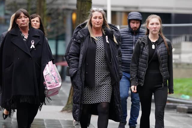 Cheryl Korbel (centre) mother of nine-year-old Olivia Pratt-Korbel, arrives with family members at Manchester Crown Court for the trial of Thomas Cashman, who is charged with murdering her daughter, who was shot in her home in Dovecot, Liverpool, on August 22.