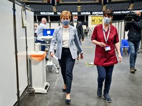 First Minister of Scotland Nicola Sturgeon arrives to receive her second dose of the Oxford/AstraZeneca Covid-19 vaccine at the NHS Louisa Jordan vaccine centre in Glasgow, Scotland. Picture date: Monday June 21, 2021.