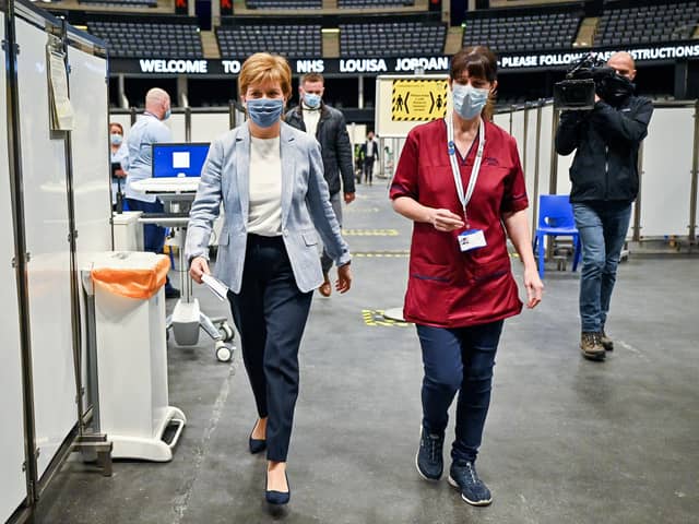 First Minister of Scotland Nicola Sturgeon arrives to receive her second dose of the Oxford/AstraZeneca Covid-19 vaccine at the NHS Louisa Jordan vaccine centre in Glasgow, Scotland. Picture date: Monday June 21, 2021.