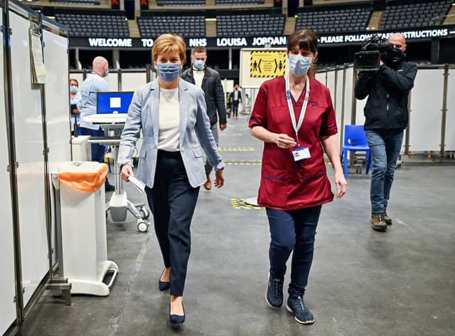 First Minister of Scotland Nicola Sturgeon arrives to receive her second dose of the Oxford/AstraZeneca Covid-19 vaccine at the NHS Louisa Jordan vaccine centre in Glasgow, Scotland. Picture date: Monday June 21, 2021.