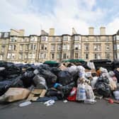 Piles of rubbish and overflowing bins on August 29, 2022, the last day of Edinburgh's bin strike. (Photo by Andrew Milligan/PA)