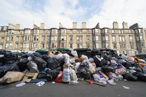 Piles of rubbish and overflowing bins on August 29, 2022, the last day of Edinburgh's bin strike. (Photo by Andrew Milligan/PA)
