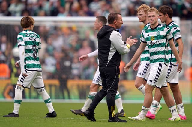 Celtic manager Brendan Rodgers applauds the players after the pre-season friendly match against Wolves.
