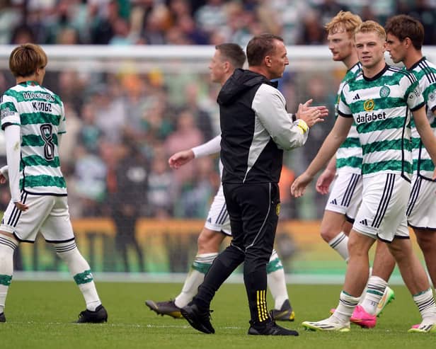 Celtic manager Brendan Rodgers applauds the players after the pre-season friendly match against Wolves.