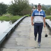 Ewen Ferguson shares a laugh as he crosses a bridge at The Club at Steyn City during the Steyn City Championship. Picture: Warren Little/Getty Images.