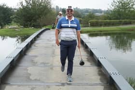 Ewen Ferguson shares a laugh as he crosses a bridge at The Club at Steyn City during the Steyn City Championship. Picture: Warren Little/Getty Images.
