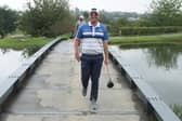 Ewen Ferguson shares a laugh as he crosses a bridge at The Club at Steyn City during the Steyn City Championship. Picture: Warren Little/Getty Images.