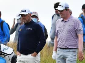 Bob MacIntyre and Lee Westwood chat during the first round of the abrdn Scottish Open at The Renaissance Club last week. Picture: Mark Runnacles/Getty Images.